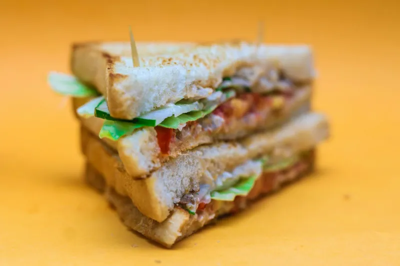 The Triple-Decker Mystery: How America's Most Popular Unknown Sandwich Conquered Every Menu